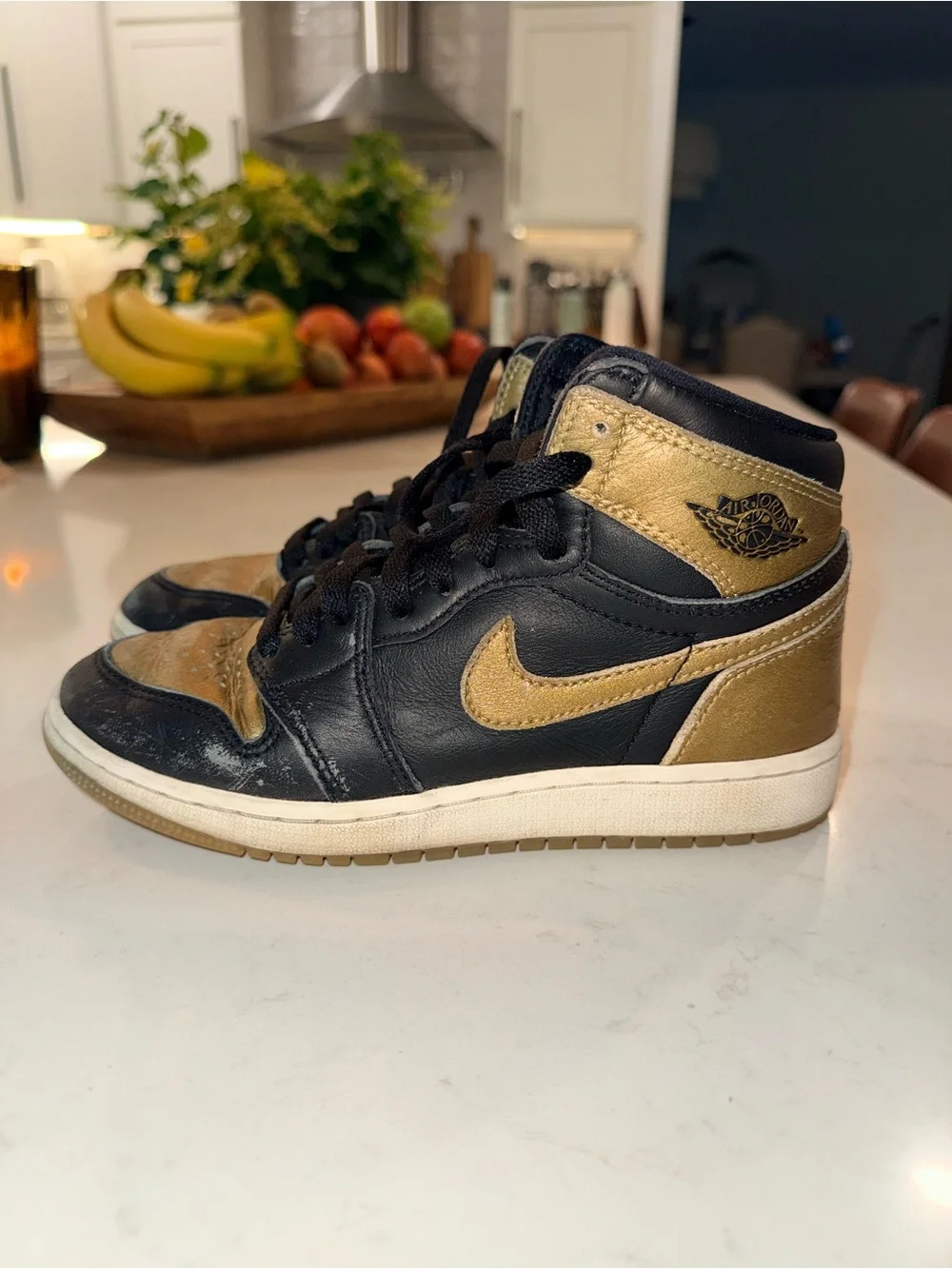 Jordan Kids Black and Gold High-Top Sneakers with White Soles